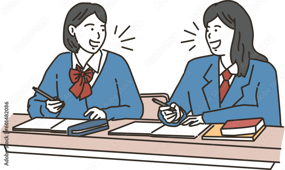 勉強をしながら会話をする女子学生達 勉強をしながら会話をする女子学生達