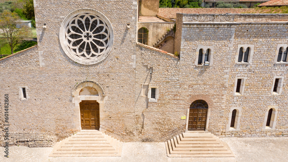 Aerial view of Valvisciolo Abbey, a Cistercian monastery located in Sermoneta, in the province of Latina, Italy. The church has a rose window and is a masterpiece of Romanesque-Cistercian architecture