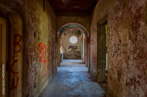 Fototapeta Naklejka Na Ścianę i Meble -  Decaying Splendor: Exploring the Abandoned Spicer Manor in Beocin, Serbia's Enigmatic Abode of Forgotten Stories