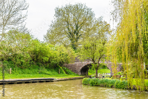 A view across a bridge over the Grand Union Canal at Long Buckby Wharf in summertime