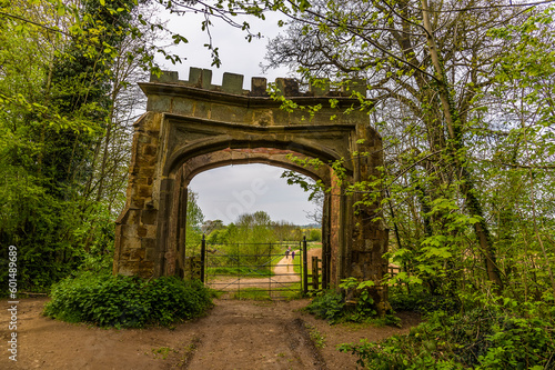A view from Badby Wood out through the entrance structure in Northamptonshire, UK in summertime