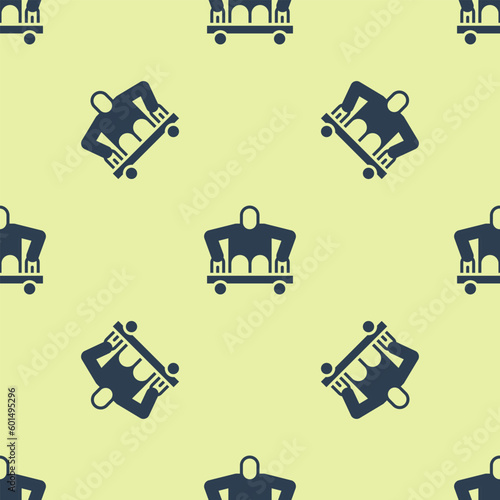 Blue Man without legs sitting wheelchair icon isolated seamless pattern on yellow background. Disability concept. Guy with physical disabilities. Vector