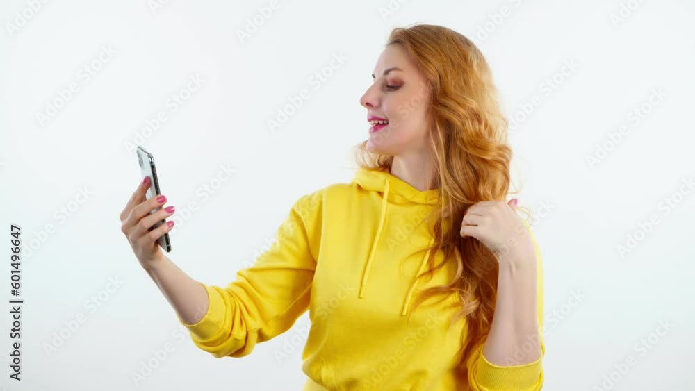 Selfie, pose and woman with phone, peace sign for social media post. Fashionable lady with mobile smartphone posing smiling, taking profile picture, studio shot isolated on white background Selfie, pose and woman with phone, peace sign for social media post. Fashionable lady with mobile smartphone posing smiling, taking profile picture, studio shot isolated on white background