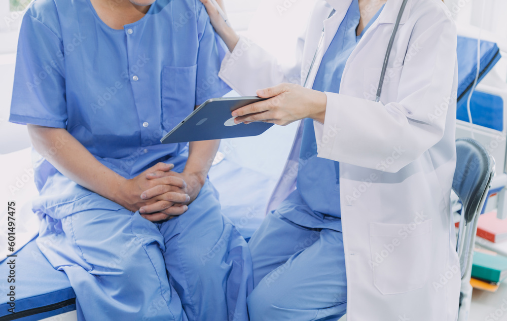 Doctor woman consulting patient sitting at doctor office. prevention of men diseases, healthcare, medical service, consultation, concept. Doctor woman consulting patient sitting at doctor office. prevention of men diseases, healthcare, medical service, consultation, concept.