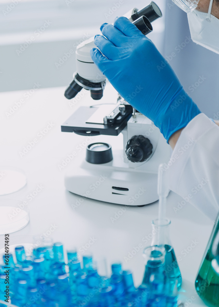hand of scientist with test tube and flask in medical chemistry lab blue banner background hand of scientist with test tube and flask in medical chemistry lab blue banner background