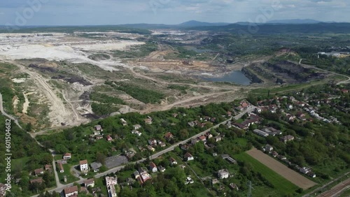 The abandoned, dead city near the Kolubara pit on coal mining by the open way. Drone view Lazarevac, Serbia. 4K footage. photo