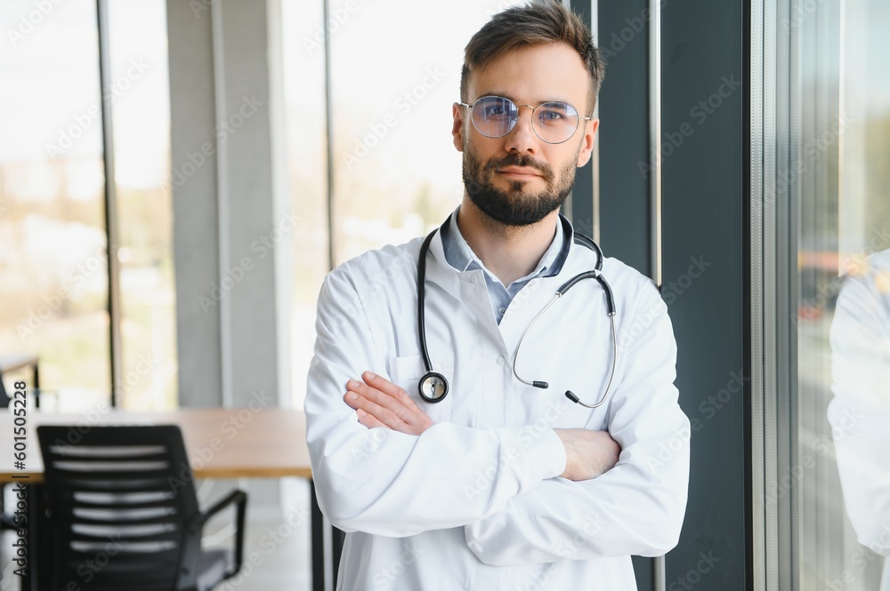 happy male medical doctor portrait in hospital happy male medical doctor portrait in hospital
