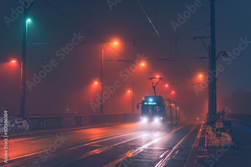 berlin tram in fog, tram in foggy wet weather, A Berlin tram drives over a foggy bridge, blurry