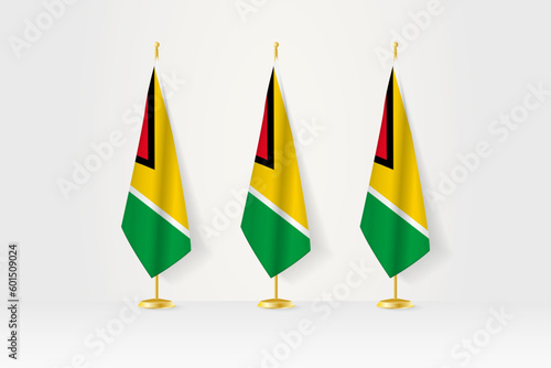 Three Guyana flags in a row on a golden stand, illustration of press conference and other meetings.