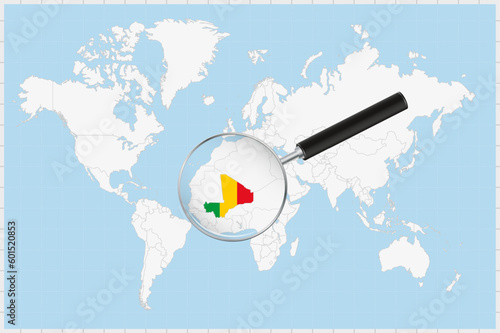 Magnifying glass showing a map of Mali on a world map.