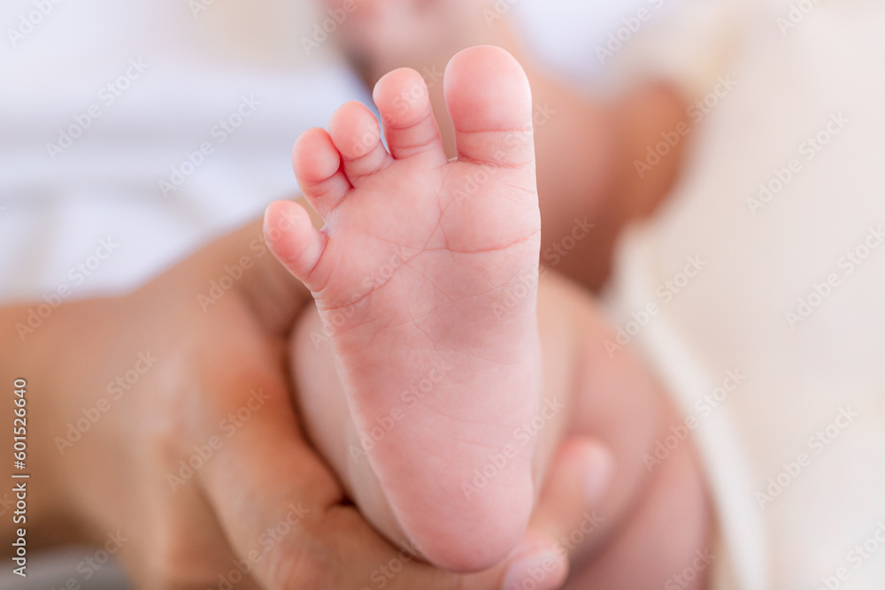 Baby feet,Baby feet in hands, mother, mother and her baby, happy family concept, beautiful conception image of childbirth. Baby feet,Baby feet in hands, mother, mother and her baby, happy family concept, beautiful conception image of childbirth.