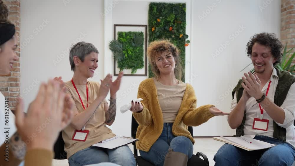 Support Group with Therapists and Woman in Focus solving problem Support Group with Therapists and Woman in Focus solving problem