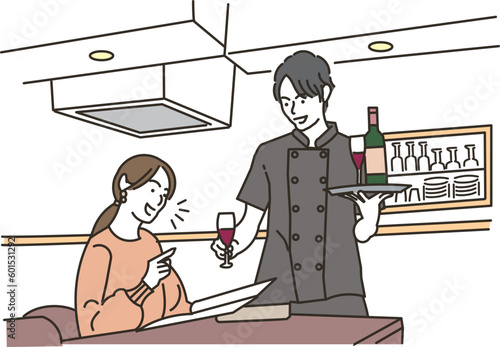 飲食店で働くアジア人の男性と女性のお客様
