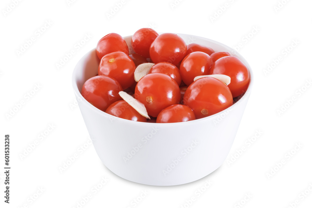 Pickled tomatoes in a bowl with garlic on a white isolated background Pickled tomatoes in a bowl with garlic on a white isolated background