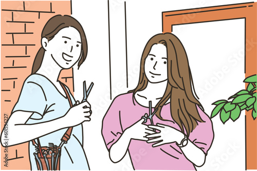 美容院の若い女性の美容師達
