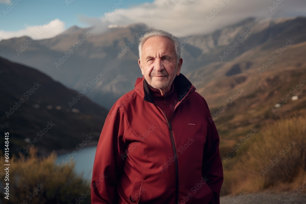 Environmental portrait photography of a satisfied man in his 70s wearing a comfortable tracksuit against a mountain landscape background. Generative AI Environmental portrait photography of a satisfied man in his 70s wearing a comfortable tracksuit against a mountain landscape background. Generative AI