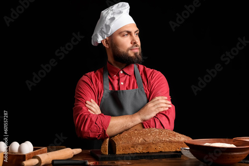 Male baker at table with ry...