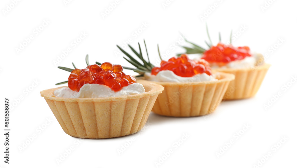 Delicious tartlets with red caviar and cream cheese on white background Delicious tartlets with red caviar and cream cheese on white background
