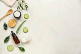 Composition with natural cosmetics and ingredients on light background