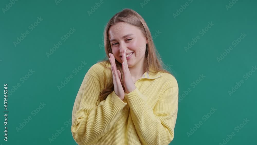 Smiling woman emotional claps hands, congratulating.Support, cheering, gratitude Smiling woman emotional claps hands, congratulating.Support, cheering, gratitude