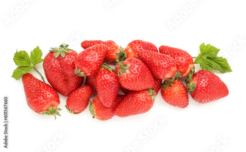 Heap of fresh strawberries with leaves on white background
