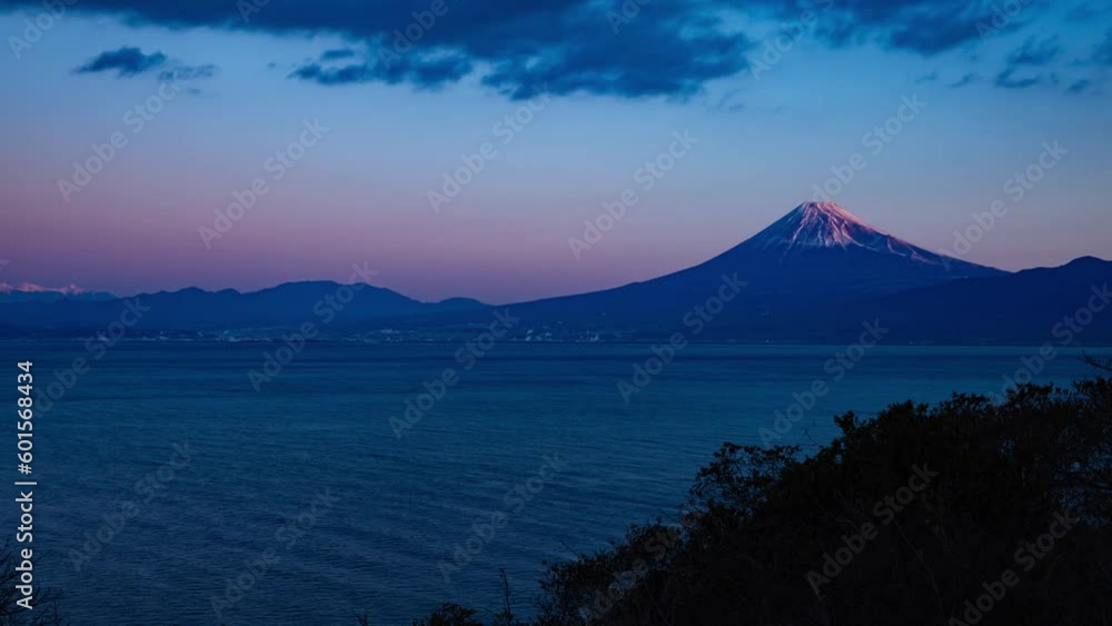 A dawn timelapse of Mt Fuji near Suruga coast in Shizuoka tilt A dawn timelapse of Mt Fuji near Suruga coast in Shizuoka tilt