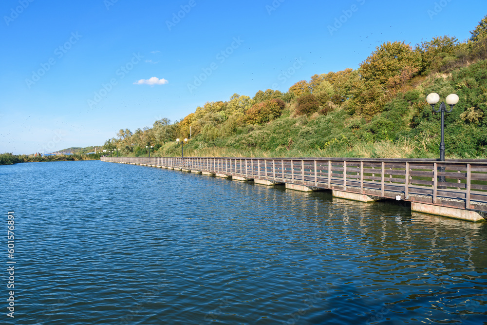 Wooden promenade along the Baltic Sea coas. Yantarny. Kaliningrad region. Russia