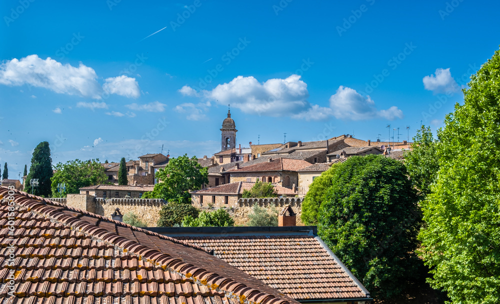 cityscape of San Quirico d'Orcia in the Tuscany region, Siena province, central Itly - Europe. historic Romanesque church of San Quirico d'Orcia