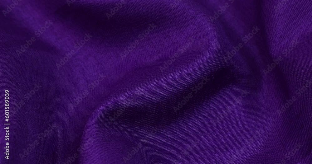 Purple fabric background. Purple cloth waves background texture. Purple fabric background. Purple cloth waves background texture.
