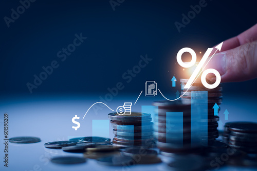 Interest rate and dividend concept. Businessman with percentage symbol and up arrow, Interest rates continue to increase, return on stocks and mutual funds, long term investment for retirement. photo