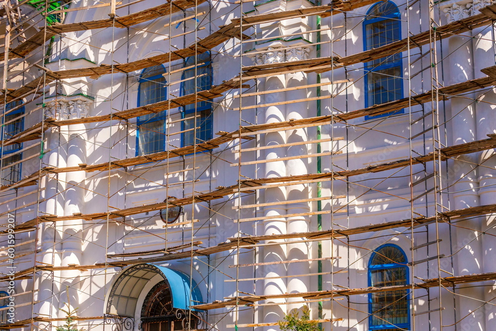 scaffolding while repairing a church on a summer sunny day