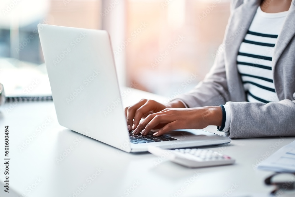 Hands, businesswoman typing on laptop and in office sitting at her desk at work. Social networking or technology, business and female person type an email or write a financial report at her workplace Hands, businesswoman typing on laptop and in office sitting at her desk at work. Social networking or technology, business and female person type an email or write a financial report at her workplace