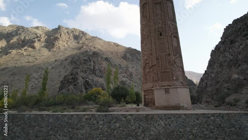 Drone flying at low altitude around ancient architecture of Jam Minaret in Afghanistan. Aerial circling photo