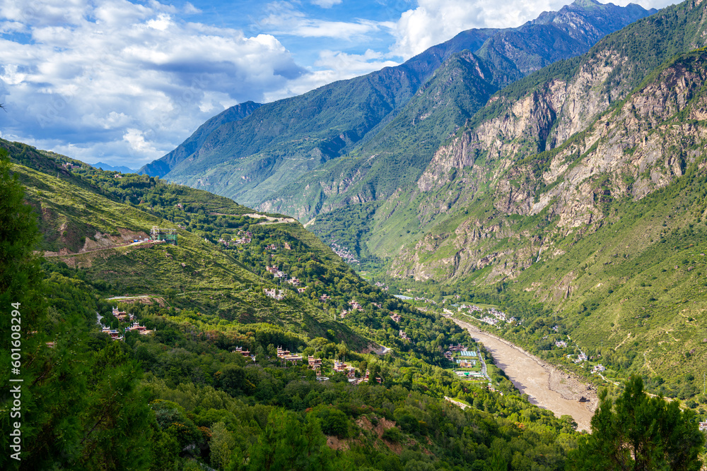 West Sichuan Plateau scenery- Danba tibetan village. Taken on the Danba, Sichuan, China. Copy space for text, background image, with the river down the valley, horizontal image West Sichuan Plateau scenery- Danba tibetan village. Taken on the Danba, Sichuan, China. Copy space for text, background image, with the river down the valley, horizontal image