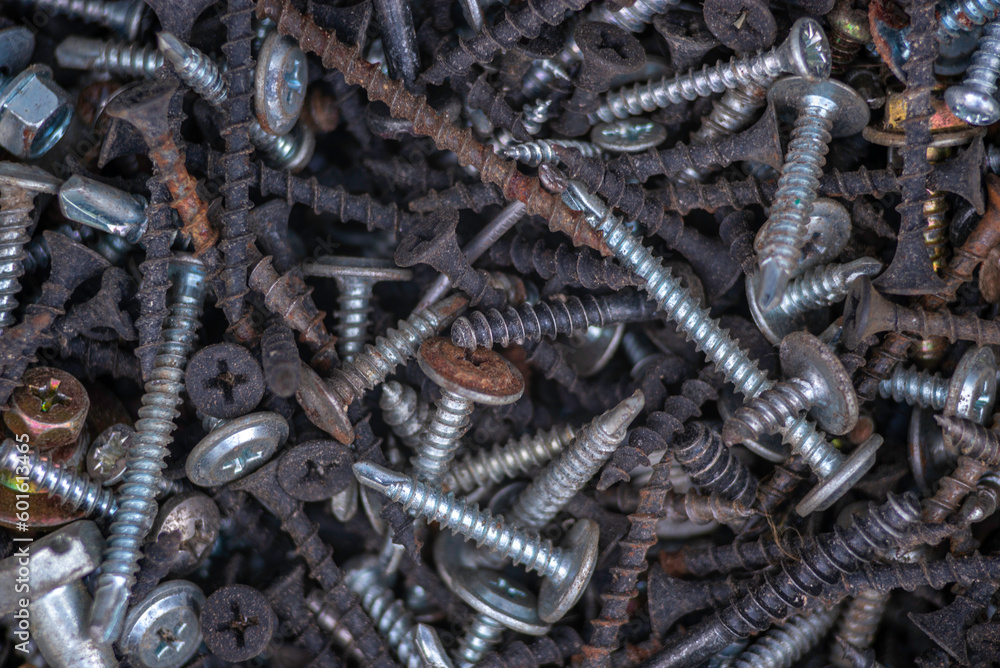 Background of iron nails screws construction steel metal texture macro close up hardware different old rusted  Top View
