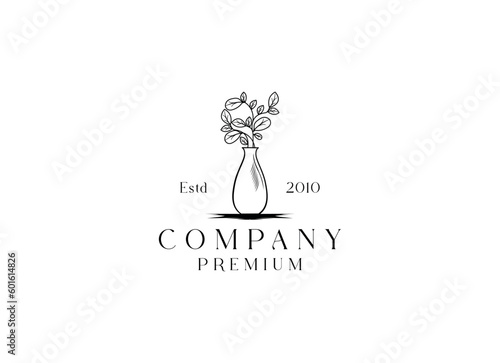 beautiful flower plant logo in vase or flowerpot in line art design style