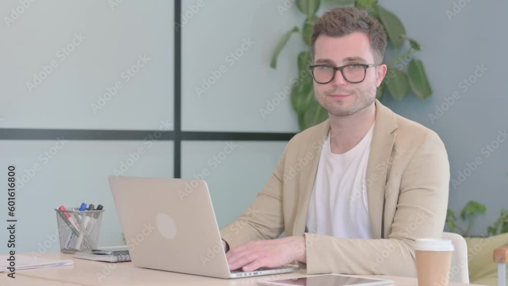No, Rejecting Young Businessman Waving Finger at Work No, Rejecting Young Businessman Waving Finger at Work