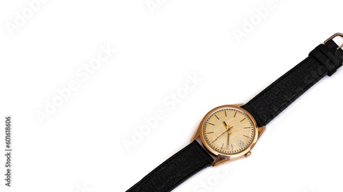 Golden wrist watch on a white background, vintage watch from the times of the ussr