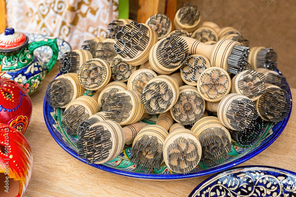 Bread stamps always decorate the flatbreads. In Uzbekistan, every piece of bread is always given a floral stamp. Souvenirs and gift concept