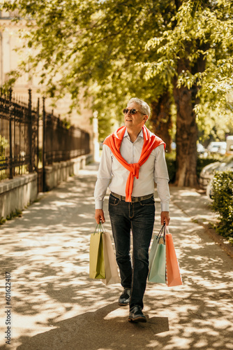 Wallpaper Mural Portrait of a senior man shopping in the city. Torontodigital.ca