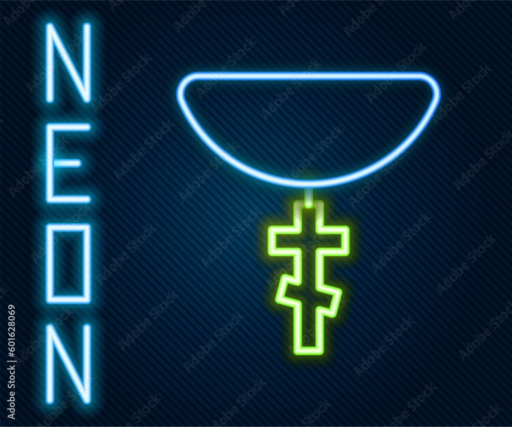Obraz premium Glowing neon line Christian cross on chain icon isolated on black background. Church cross. Colorful outline concept. Vector