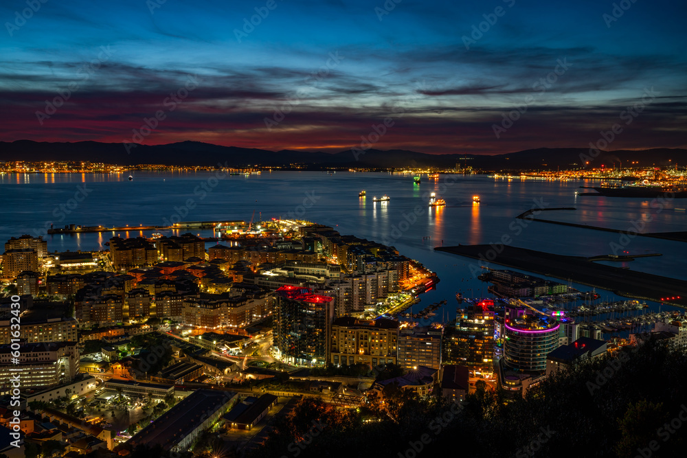 Colorful sunset over Gibraltar town and  the Bay of Gibraltar, UK