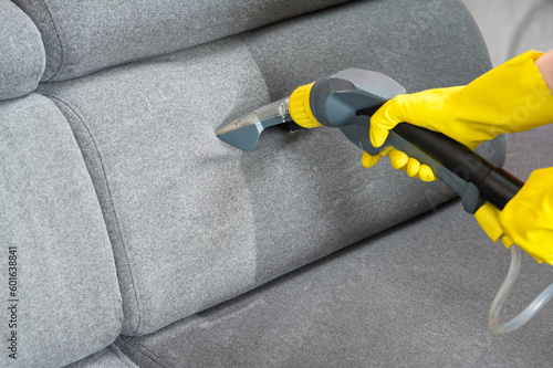 Sofa before and after wet - cleaning indoors. textile sofa vacuum cleaning. professional cleaning service concept.