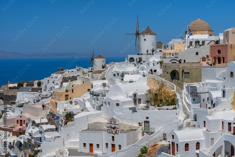 picturesque cityscape on the island of Santorini with traditional whitewashed houses