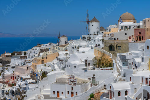 picturesque cityscape on the island of Santorini with traditional whitewashed houses