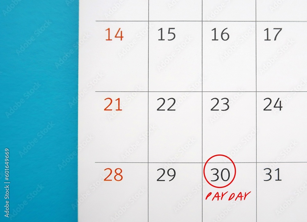 Calendar on blue background with circle on date 30 with text PAYDAY, a day on which someone is paid or expects to be paid their wages Calendar on blue background with circle on date 30 with text PAYDAY, a day on which someone is paid or expects to be paid their wages