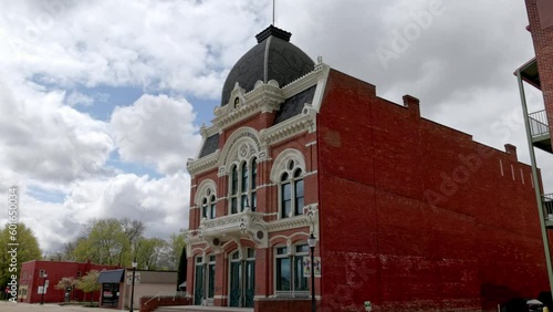 Historic Tibbits Opera House in Coldwater, Michigan with gimbal video walking forward from the side. photo