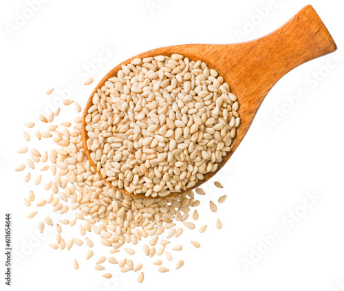 Roast white sesame seeds in the wooden spoon, isolated on white background, top view.