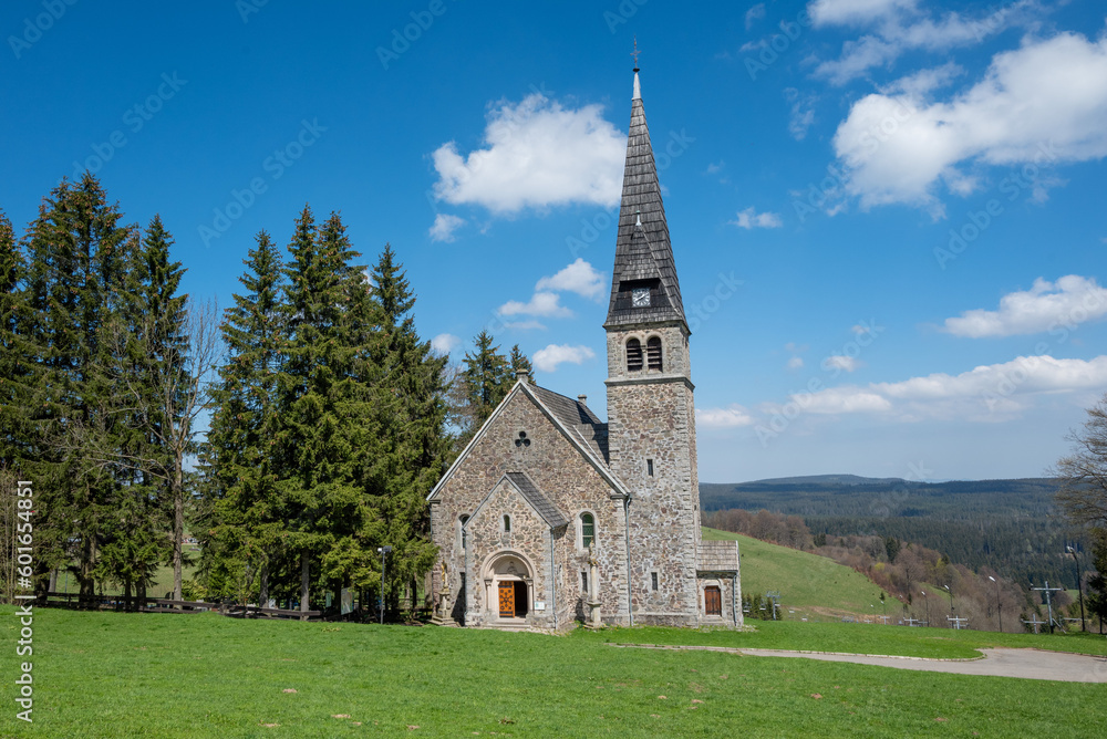 Picturesque Neo-Romanesque church in Zieleniec Duszniki Zdroj in the Orlickie Mountains, Poland