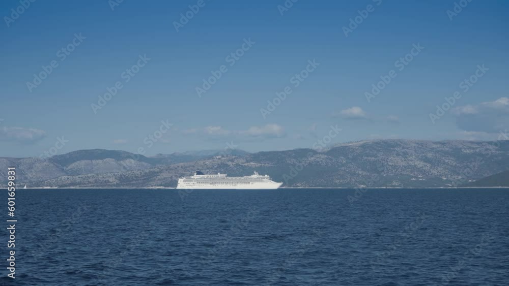 Luxury cruiser sailing in Corfu island bay, slow motion Luxury cruiser sailing in Corfu island bay, slow motion